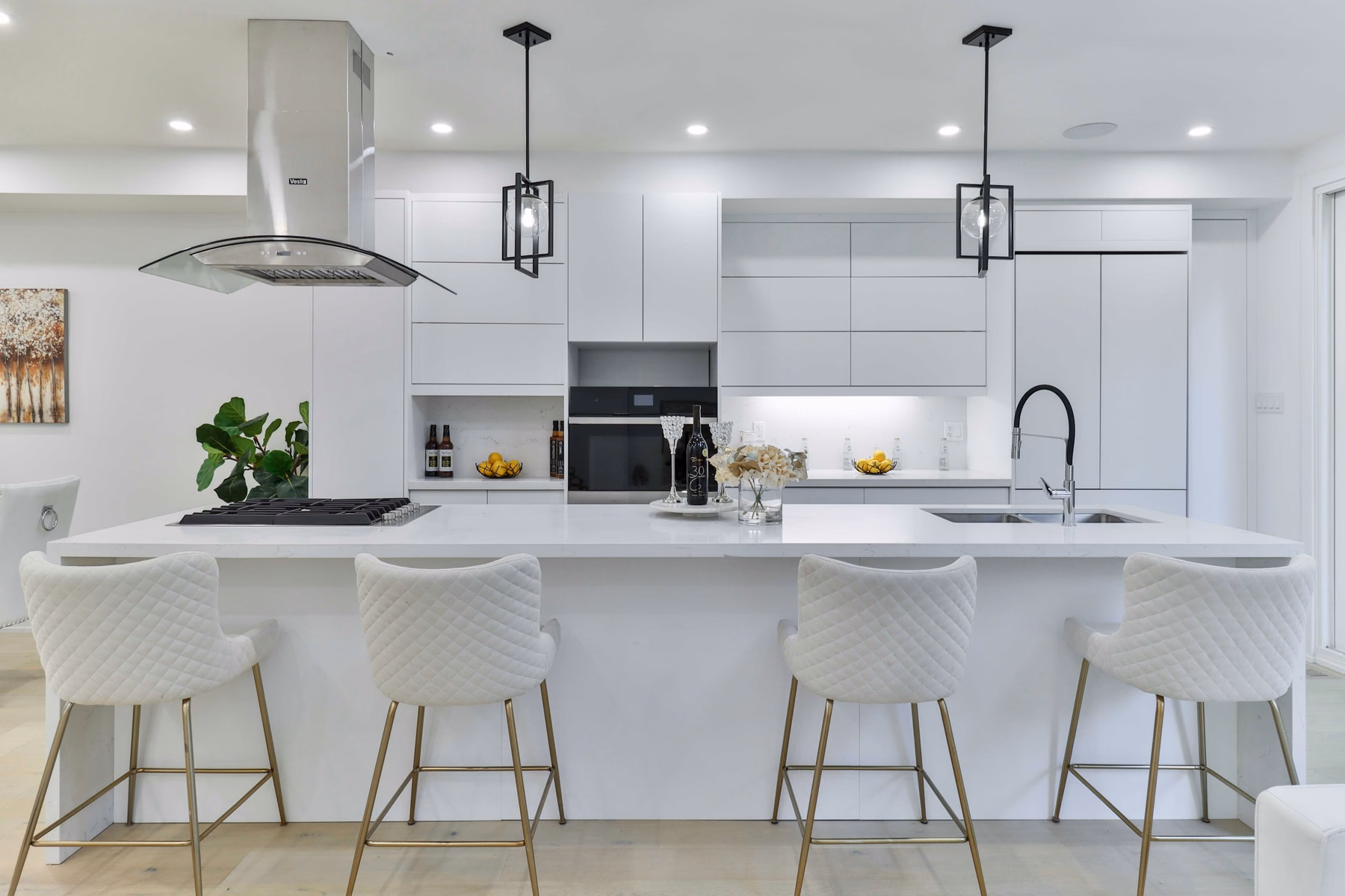 Bright white kitchen with a long island